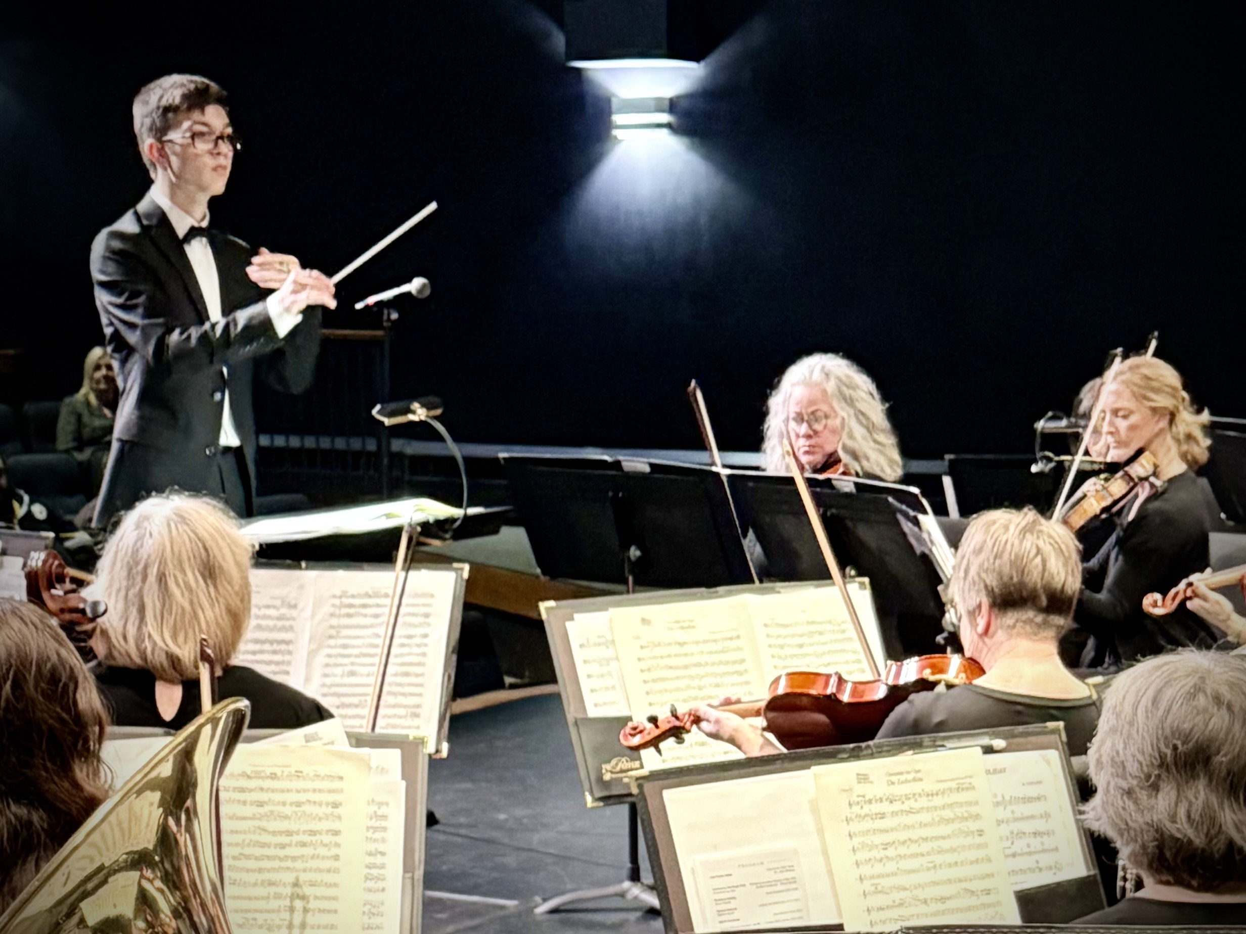 Sorren Morelli leads the Venango County Symphony Orchestra in this photo.